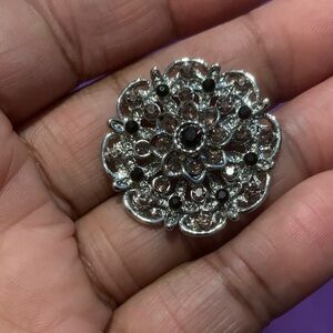 Elegant Silver Floral Brooch